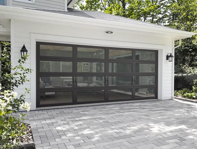 Manhattan Beach Garage Door Repair design specialist presenting custom garage door options to Manhattan Beach homeowner