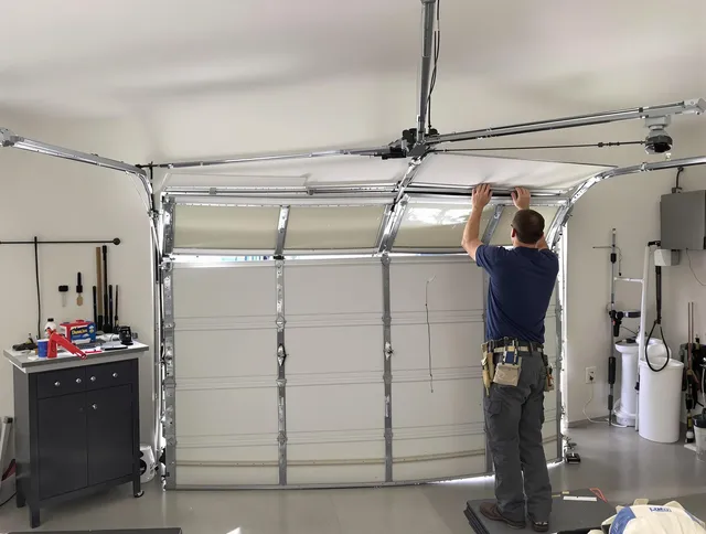 Manhattan Beach Garage Door Repair specialist performing precise section replacement on Manhattan Beach garage door