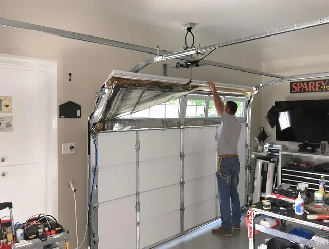 Garage door section replacement by Manhattan Beach Garage Door Repair in Manhattan Beach